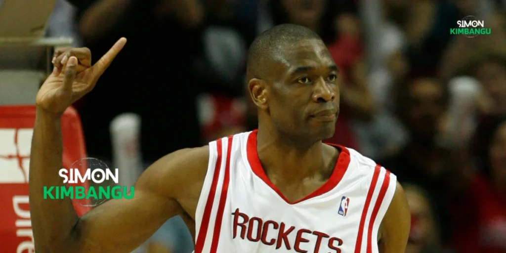 La Biographie de Dikembe Mutombo : Un Géant du Basketball et de l'Humanitaire 1 La Biographie de Dikembe Mutombo